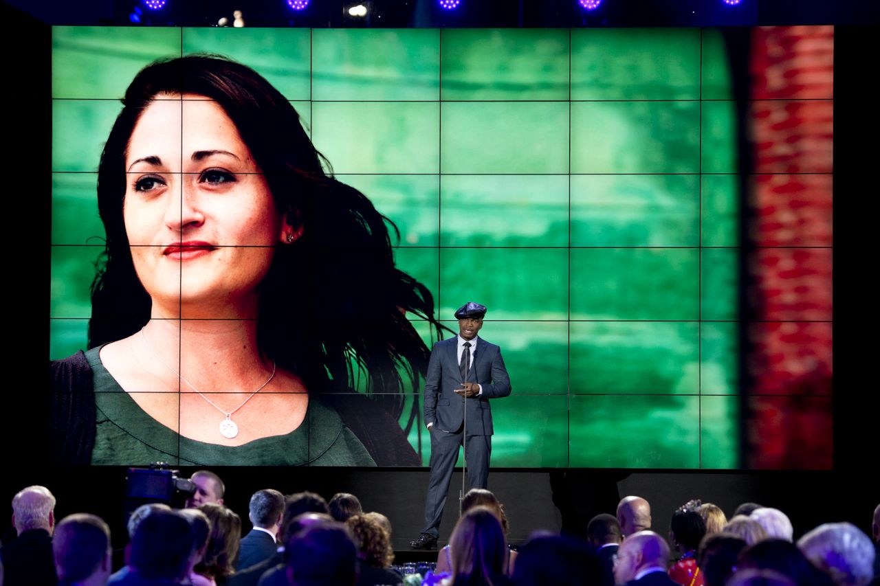 Grammy Award-winning artist Ne-Yo presents CNN Hero Danielle Gletow during the show.