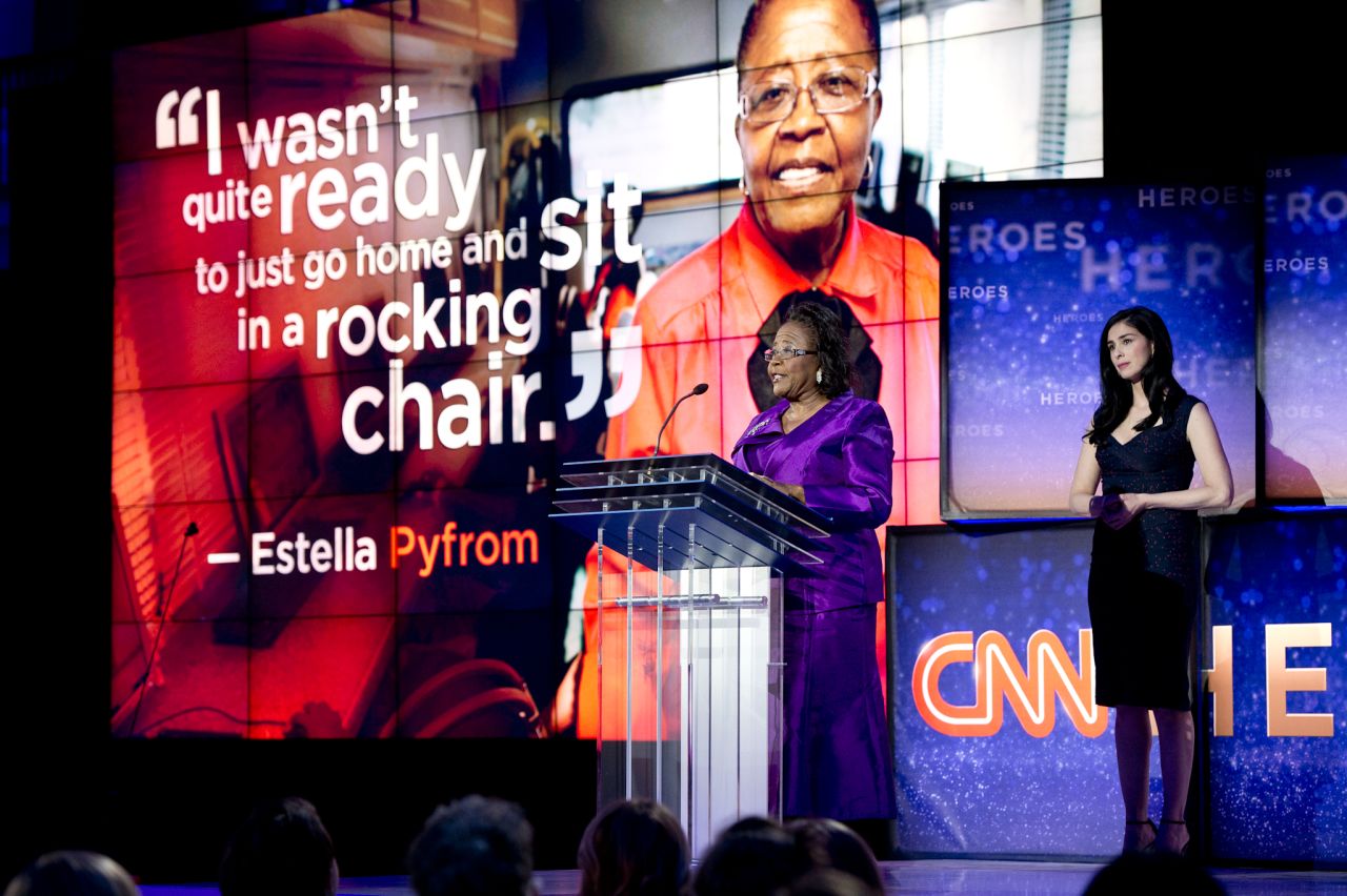 CNN Hero Estella Pyfrom accepts her award as comedian Sarah Silverman looks on. Pyfrom used her life savings to create "Estella's Brilliant Bus," a mobile computer lab that provides tutoring for thousands of low-income students in Palm Beach County, Florida.