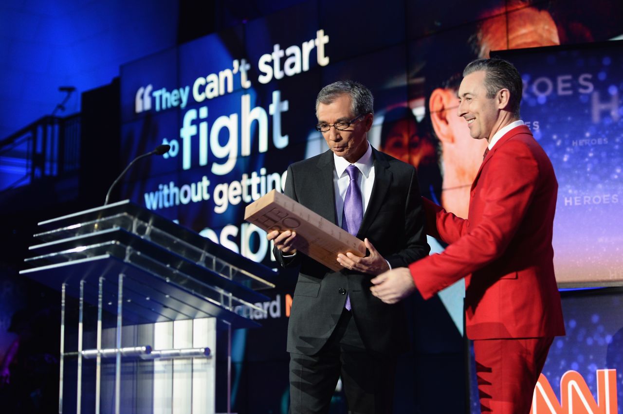 CNN Hero Richard Nares is presented an award from actor Alan Cumming. Nares organizes transportation for sick children who have trouble getting to their chemotherapy appointments.