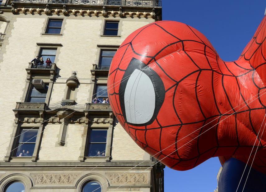 The Spider-Man balloon floats down New York's Central Park West during the Macy's Thanksgiving Day Parade on Thursday, November 28. After fears they could be grounded due to high winds, the parade's iconic balloons were given the all-clear from the New York Police Department.