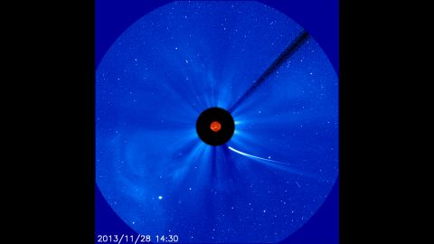 Comet ISON's position is seen near the sun at 9:30 a.m. ET on November 28. This composite image comes from NASA and the European Space Agency.