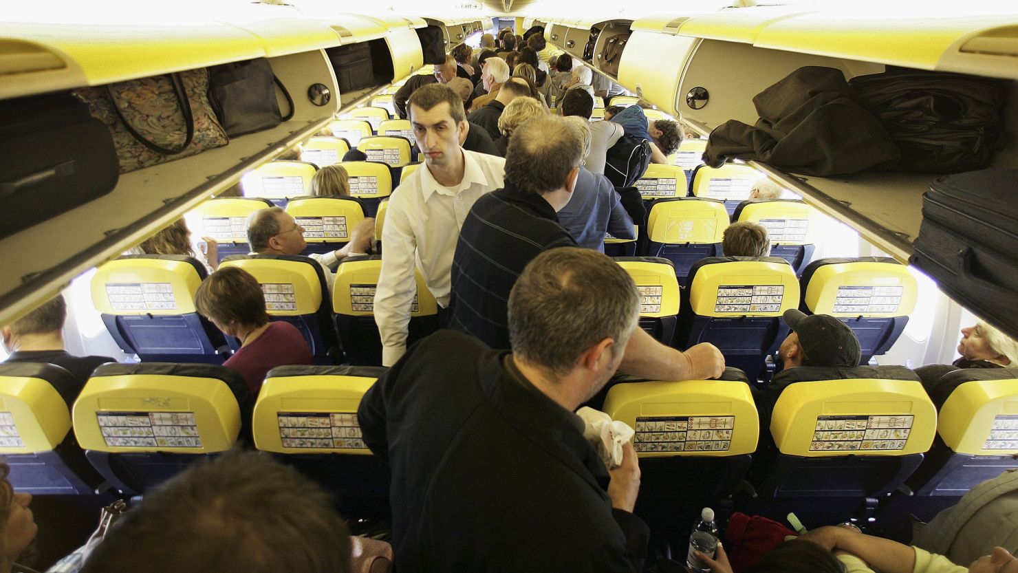 'Please take your seats, and just chill out.' Air travel can be far from relaxing.