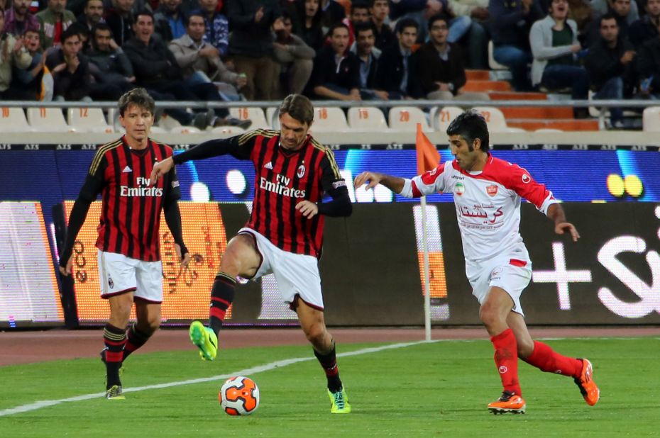 The star-studded Milan side included legendary defender Paolo Maldini, pictured center with teammate Stefano Eranio and Persepolis' Pejman Jamshidi (right). Maldini spent his entire career at Milan before retiring at the age of 41 in 2009.