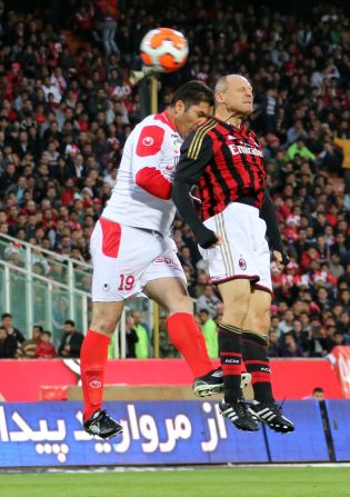 Former Italy defender Pietro Vierchowod played more than 550 games in Serie A, but had only a brief spell at Milan late in his career. The 54-year-old here contests a header with Payan Rafat, who had two spells with Persepolis -- one of Asia's most popular clubs -- before becoming a coach. 