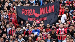 Iranian supporters of Italian club AC Milan are seen during the match against former Persepolis players at the Azadi stadium in Tehran on November 28, 2013. AC.Milan won 3-1. AFP PHOTO / ATTA KENARE (Photo credit should read ATTA KENARE/AFP/Getty Images