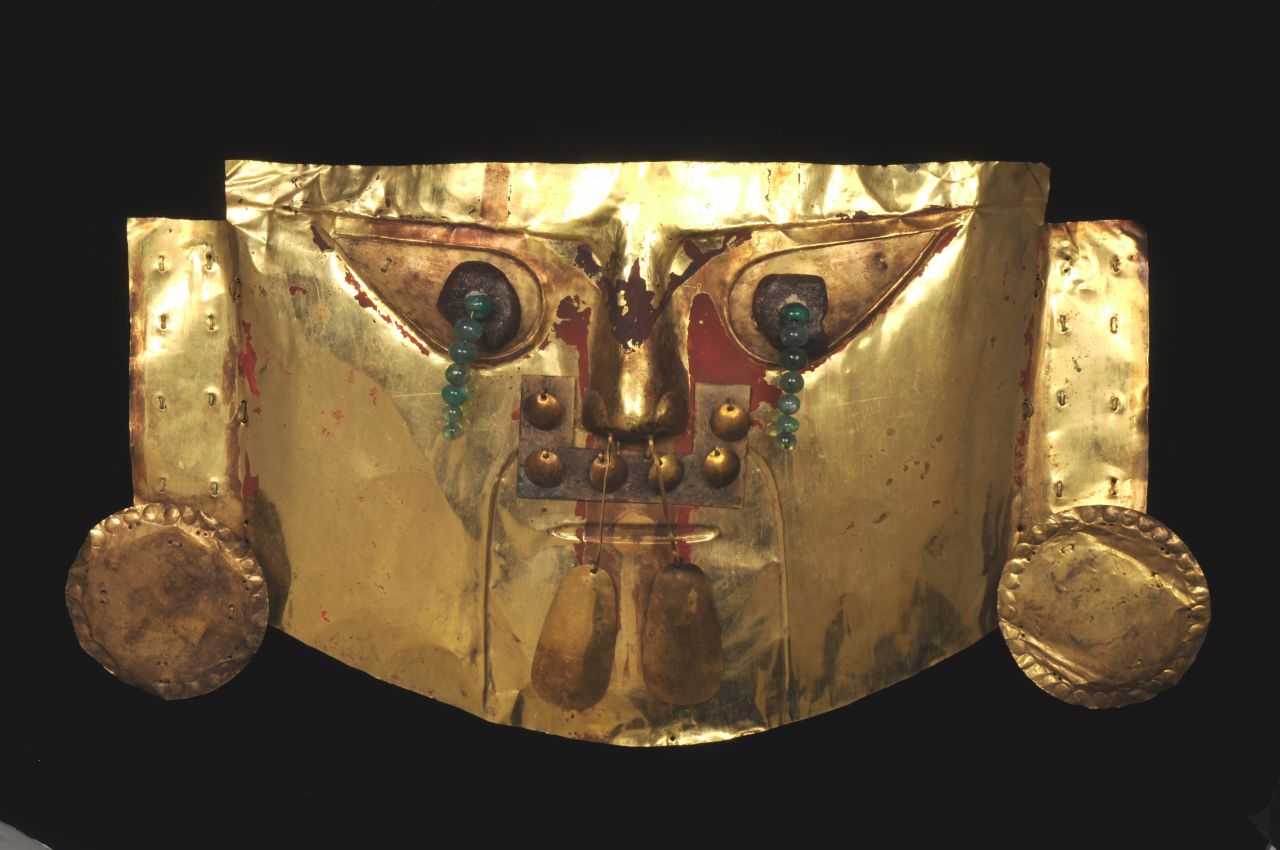 Historically, jewelers set the emeralds in yellow gold, which was thought to be the purest form of metal and the closest thing to Godliness. Emeralds on this funerary mask from Lambayeke, Peru, are meant to represent eyes.