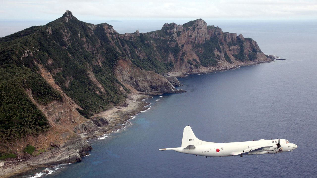A Japan Self-Defense Force planes flies over the Senkaku Islands in this file photo.