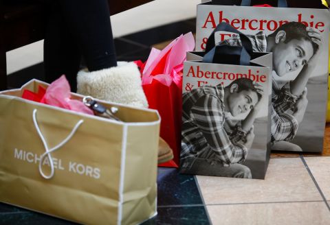 Bags sit on the ground as shoppers hunt for Black Friday deals at Somerset Collection  mall on November 29 in Troy, Michigan.