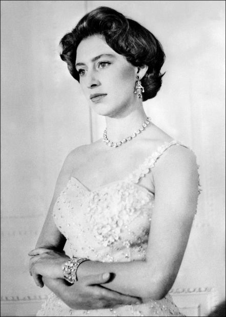Princess Margaret was known as a great beauty of her time, and a London "it" girl in the 1950s. She had greater freedom to follow fashion than her sister Queen Elizabeth II, who needed to dress for diplomacy and champion British designers. Here she is pictured on her 26th birthday. 