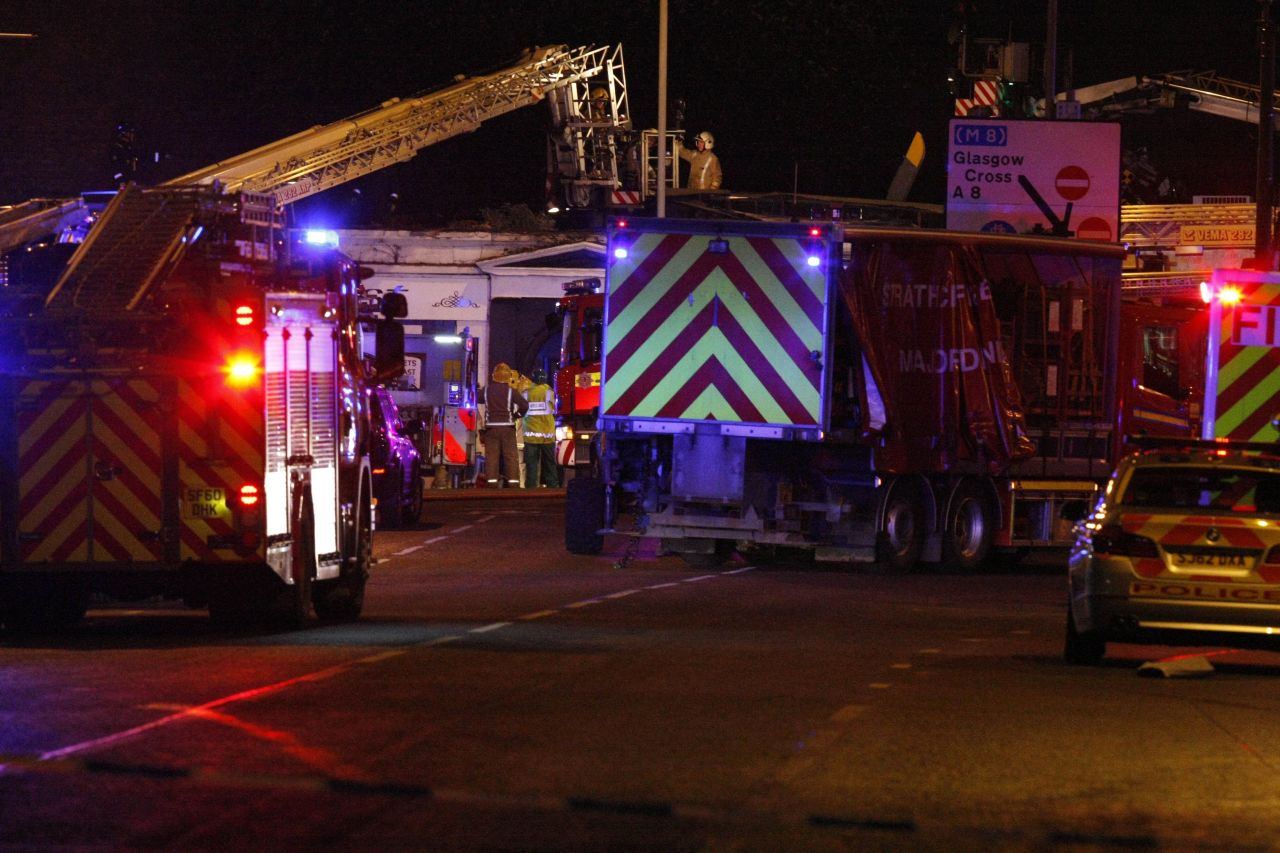 The helicopter continued to smolder hours after the crash.