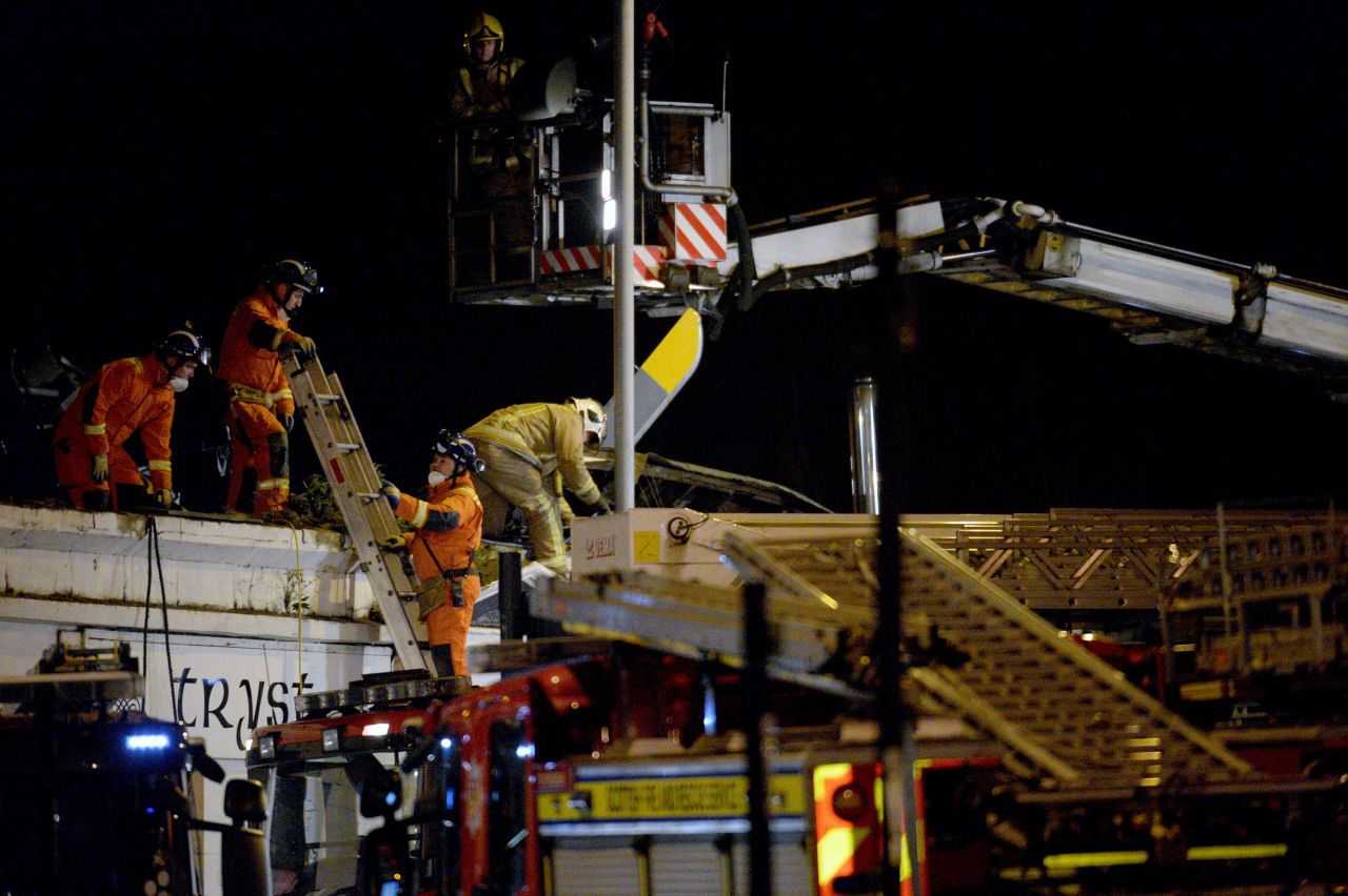 Witnesses reported seeing people who appeared injured running from The Clutha pub after the crash.