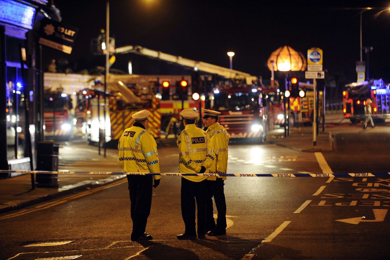 Emergency workers gather near the scene of the crash.
