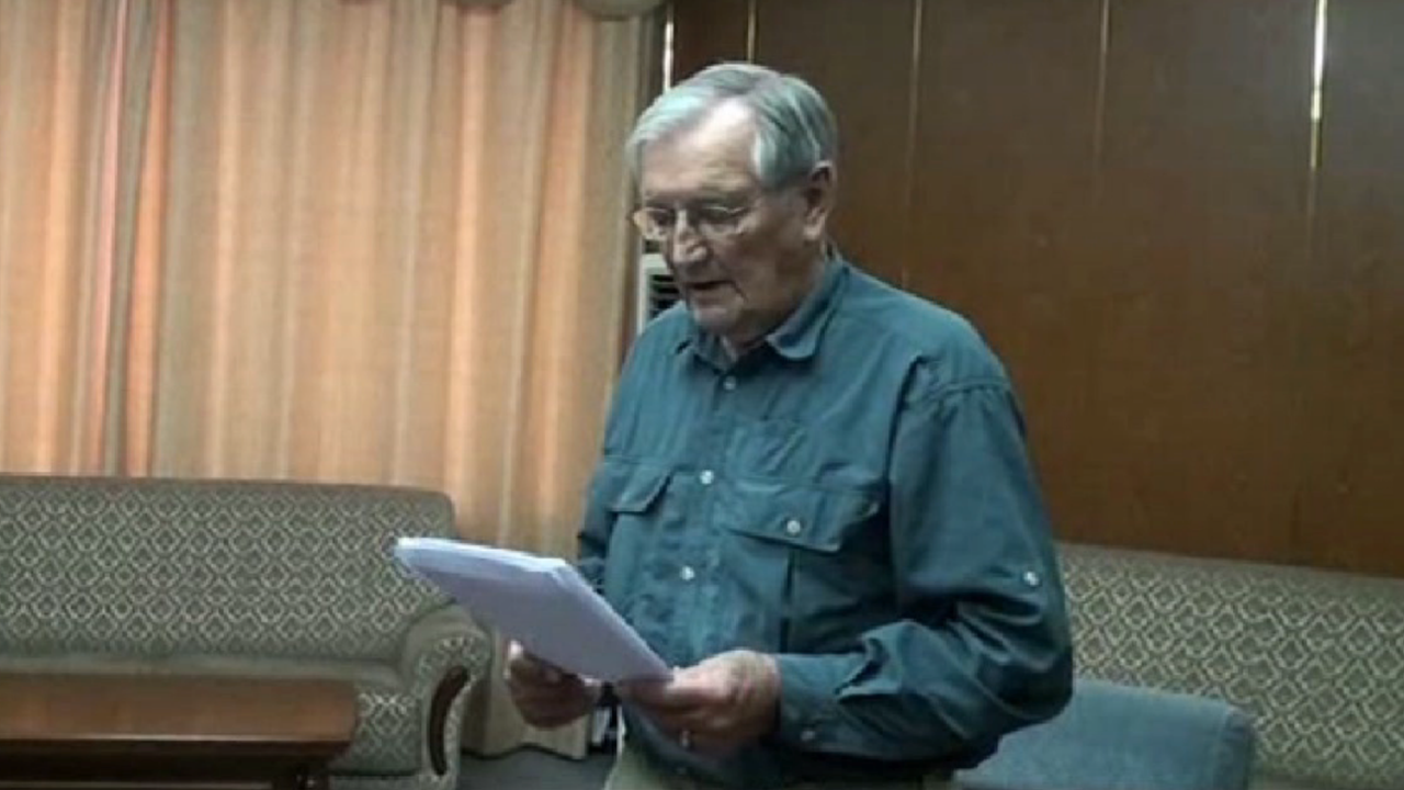 Merrill Newman, an 85-year-old American, reads a statement in an image from a video released by North Korea's state-run news agency.