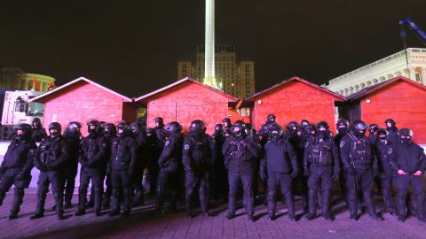 Police officers guard Independence Square on November 30 after dispersing a rally.
