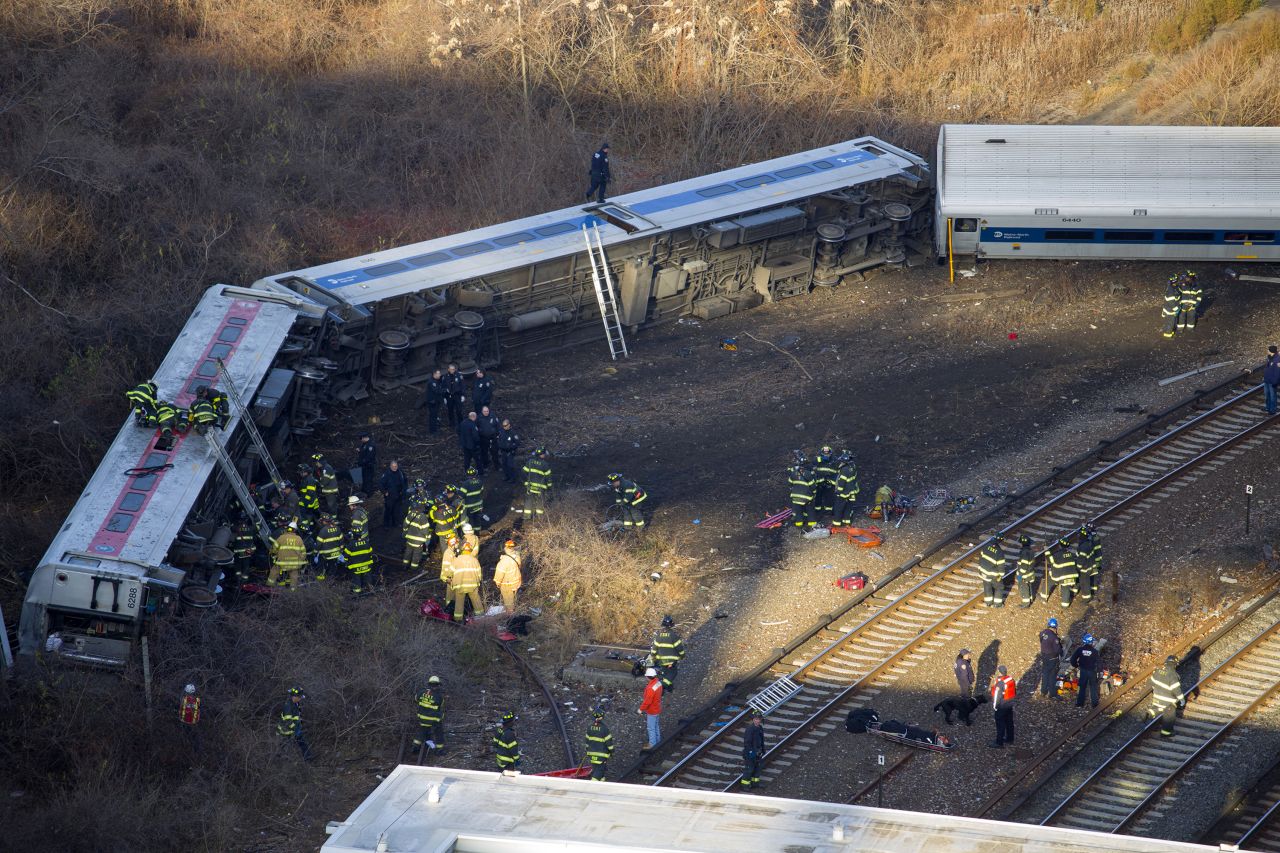 First responders gather at the scene of the derailment.
