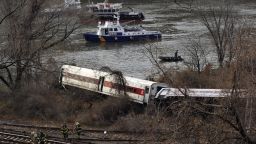 Emergency crews at the scene of a commuter train wreck on Dec 1, 2013 in the Bronx borough of New York. The train bound for New York's Grand Central Station derailed in the Bronx Sunday with at least four people reported dead after several rail cars left the tracks near the Spuyten Duyvil railroad station. The southbound train was traveling from Poughkeepsie to Grand Central Terminal when the accident occurred. AFP PHOTO / TIMOTHY CLARY        (Photo credit should read TIMOTHY CLARY/AFP/Getty Images)