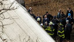 NEW YORK, NY - DECEMBER 1:  New York Gov. Andrew M. Cuomo (3L) inspects the damage along with emergency crews after Metro-North train derailed near the Spuyten Duyvil station December 1, 2013 in the Bronx borough of New York City. Multiple injuries and several deaths were reported after the seven car train left the tracks as it was heading to Grand Central Terminal along the Hudson River line.  (Photo by Christopher Gregory/Getty Images)