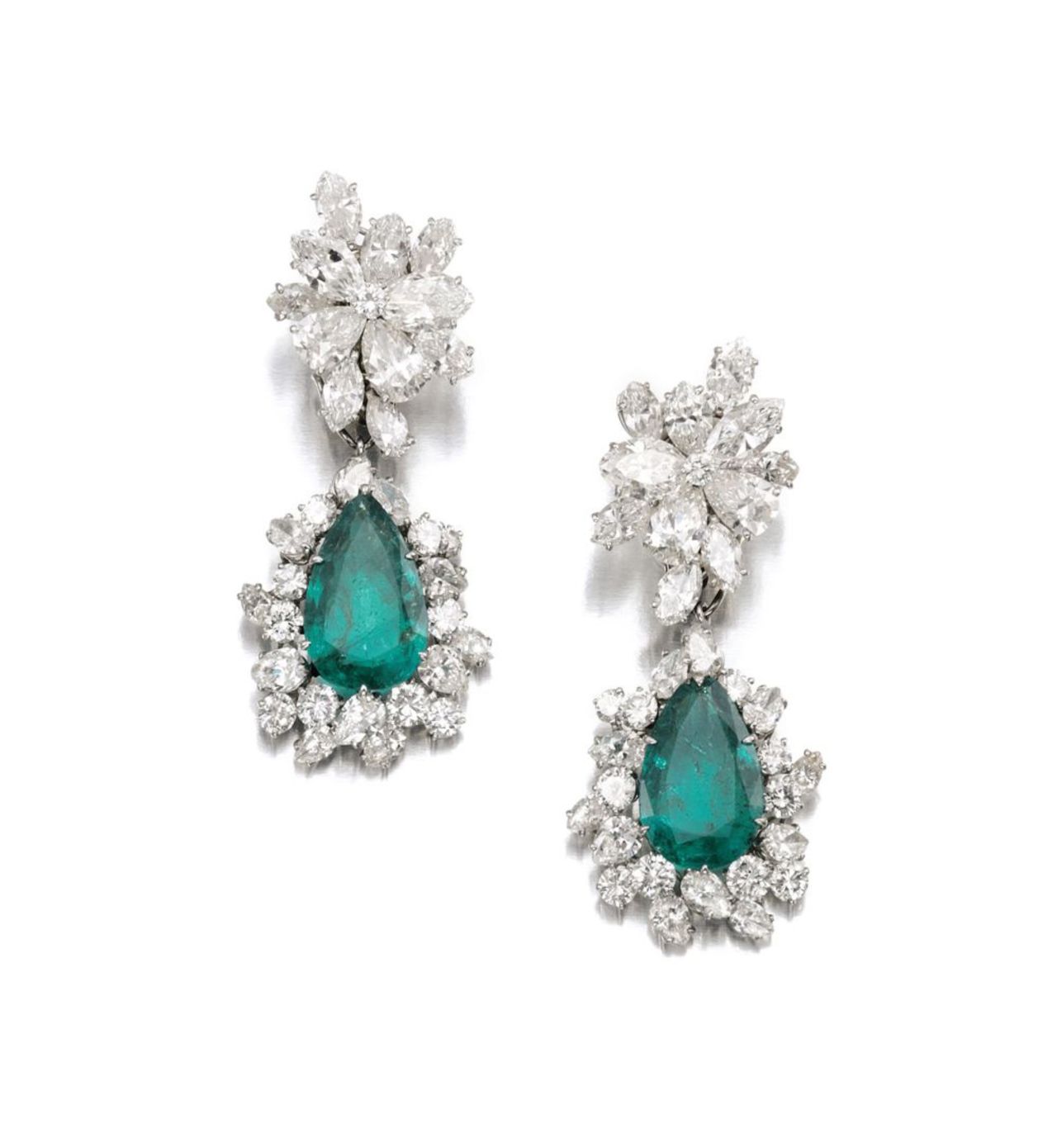 The intricate emerald and diamond earrings were made by the Italian jeweler Bulgari in 1964, and were auctioned by Sotheby's in May.