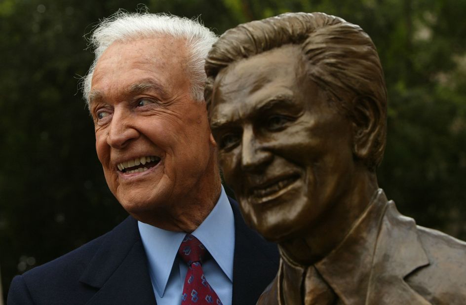 Barker poses next to a sculpture of himself as he was inducted into the Television Academy Hall of Fame in 2004.