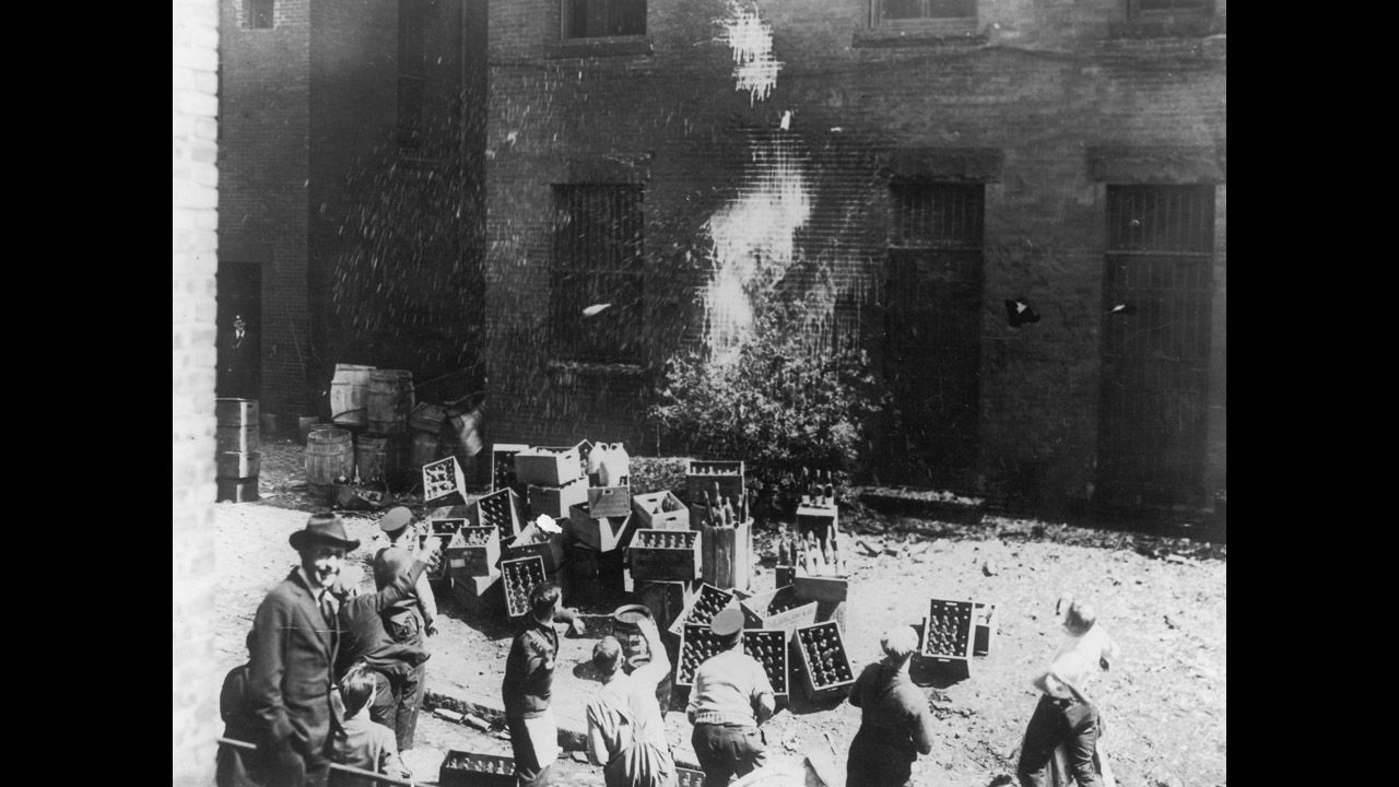 Men destroy wine and spirits in Boston during Prohibition. By January 1919 ratification was complete.