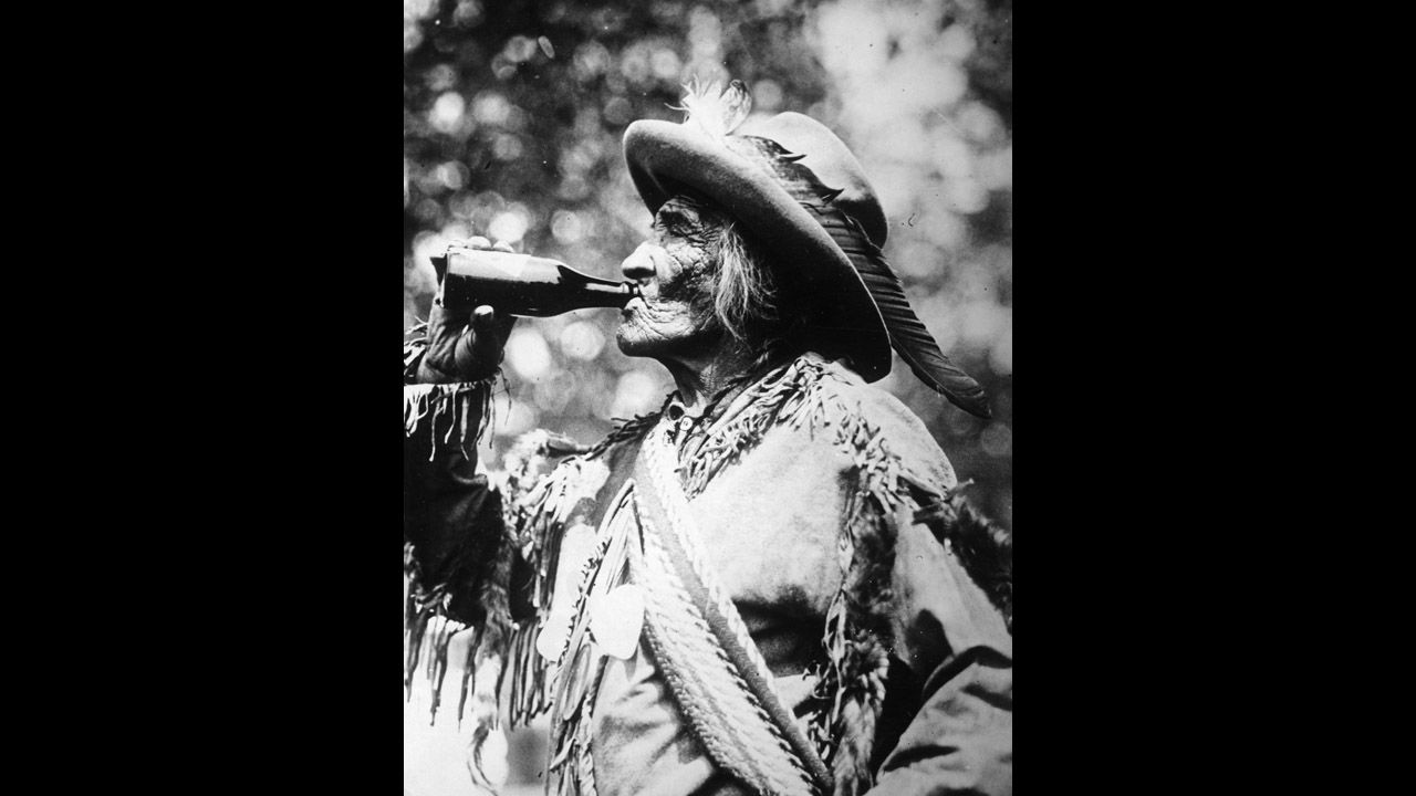 The 105-year-old Indian chief "Many Tail Feathers" drinks milk instead of whiskey during Prohibition in 1929.