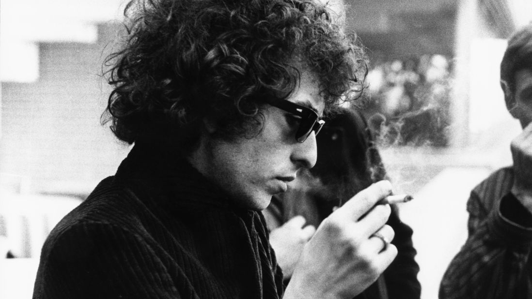 Bob Dylan smokes a cigarette circa 1966. Dylan's music spoke to a generation of people during the 1960s, a tumultuous decade that forever changed America. He went on to become a rock 'n' roll legend and influence many musicians to come. In October 2016, the Nobel Prize in Literature was awarded to Dylan for "having created new poetic expressions within the great American song tradition."