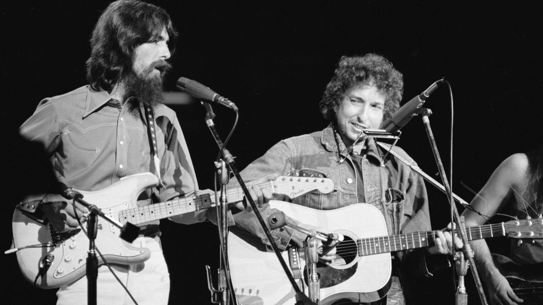 George Harrison and Dylan perform in the Concert for Bangladesh, held August 1, 1971 at Madison Square Garden in New York. The concert earned them the Grammy Award for Album of the Year along with Billy Preston, Eric Clapton, Klaus Voormann, Leon Russell, Ravi Shankar and Ringo Starr.