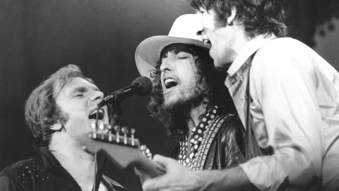 Dylan performs with Robbie Robertson of The Band, right, and Van Morrison at The Band's farewell concert in 1976.