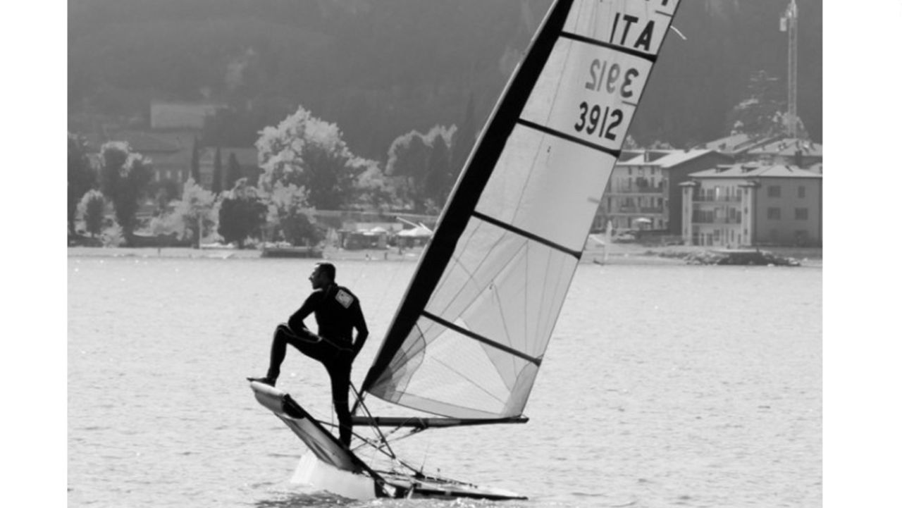 Here Stefano Rizzi poses as he waits for the start of the International Moth class's Italian Open Championship at Lake Garda. He went on to win a relatively wind-less event.