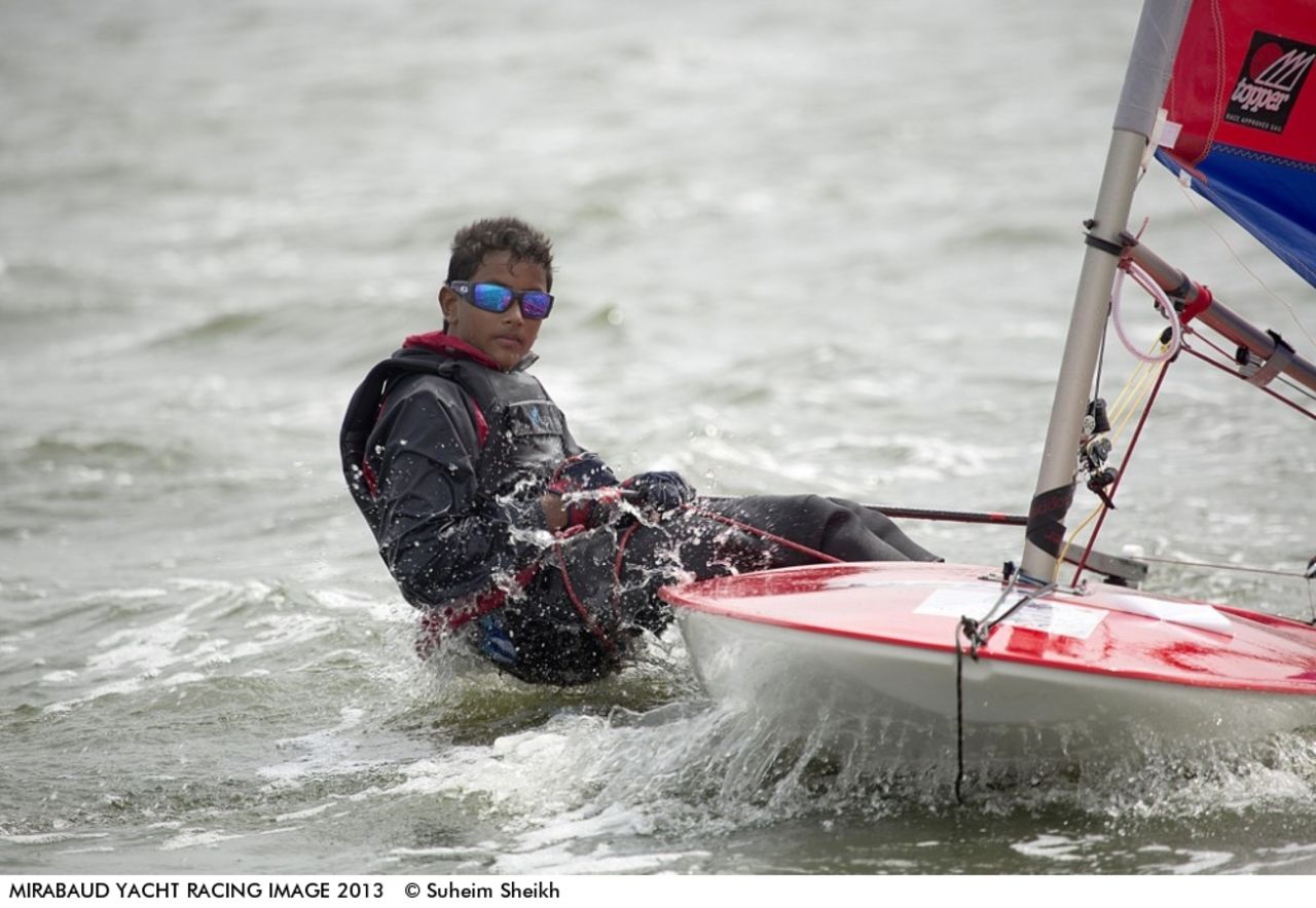 Dheer Singhi, of Chennai, tackles winds of 23 knots during a race at India's Topper class national championships. He went on to tie with Vishnu Sujeesh but had to settle for silver on a countback.