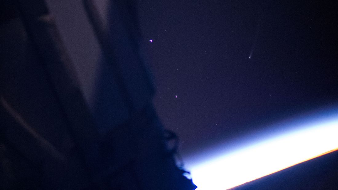 Comet ISON, right of center in the frame and distinguishable by it's tail, is seen in this photo taken by a crew member aboard the International Space Station on Saturday, November 23.