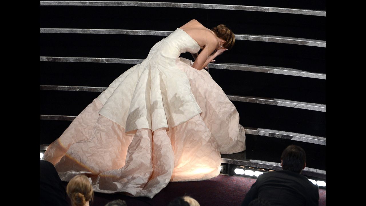 <strong>February 24:</strong> Actress Jennifer Lawrence falls during the Academy Awards as she walks up stairs to receive the Best Actress Oscar for "Silver Linings Playbook."