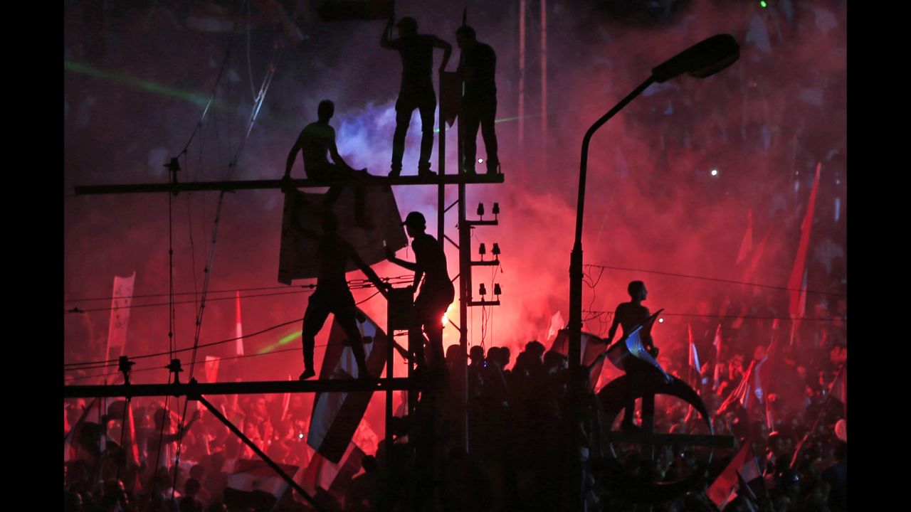 <strong>July 3:</strong> Opponents of Egyptian President Mohamed Morsy celebrate in Cairo after Morsy was ousted in a military coup.