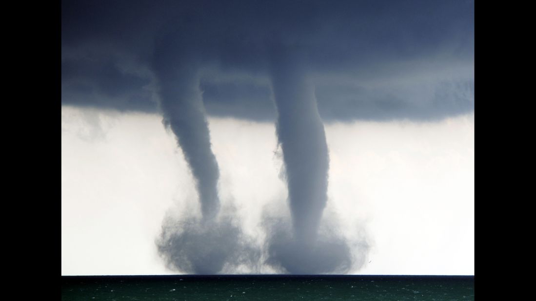 <strong>September 12:</strong> A pair of waterspouts form on Lake Michigan, southeast of Kenosha, Wisconsin.