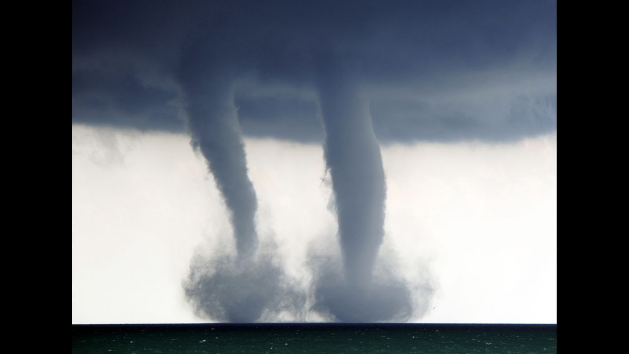 <strong>September 12:</strong> A pair of waterspouts form on Lake Michigan, southeast of Kenosha, Wisconsin.