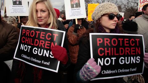 Thousands marched in Washington for gun control in January last year after the Sandy Hook school murders.