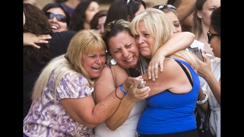 <strong>May 8:</strong> Kathy Brown, Virginia Aguiar and Jane Crook react to a guilty verdict for Jodi Arias outside the Maricopa County Superior Court in Phoenix. Arias was convicted of murdering her ex-boyfriend, Travis Alexander, in 2008.