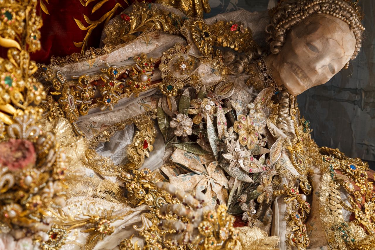 <em>St. Luciana arrived at the convent in Heiligkreuztal, Germany in the mid-eighteenth century</em><br /><br /><strong>CNN: What was the purpose of decorating the skeletons in gold and jewelry?</strong><br /><br /><strong>Paul Koudounaris: </strong>It provided a new and important form of propaganda: these skeletons, shipped northward and then decorated in this elaborate and opulent way, were a means to say that the greatest glory is reserved for those who remain true to the faith, and are willing to make the ultimate sacrifice in its name. In effect, the extravagant decoration of these skeletons provided a symbol of the glory that those who remained faithful to the Catholic church could expect in heaven.