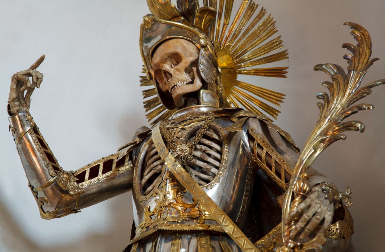 <em>St. Pancratius in Wil, Switzerland was dressed as a Roman soldier in 1672. Artisans added the armor suit in the 18th century</em><br /><br /><strong>CNN: Did artisans always come from the Catholic church?</strong><br /><br /><strong>PK: </strong>The people who decorated the skeletons were most commonly nuns. If not nuns, maybe monks or lay brothers affiliated with a local religious organization. Only when something special was needed—for cases in which it was desired to decorate the skeleton with a silver suit of armor, for instance, as was sometimes done—did they contract with secular artisans. <br /><br />Nuns in particular were a perfect choice for decorating skeletons like this. They were frequently involved in textile work, lace work, and beading, which they practiced on a very high level. These are what we might consider craft arts, but the exact kind of skills that were necessary for decorating a skeleton in this way.