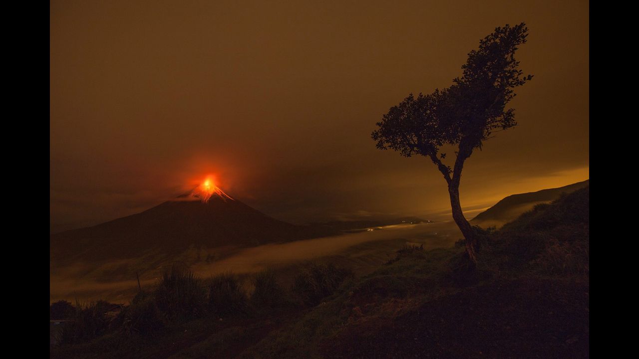 <strong>May 8:</strong> The Tungurahua volcano is seen from the village of Cotalo, Ecuador. Tungurahua keeps generating explosions and expelling incandescent boulders that roll down its flanks.