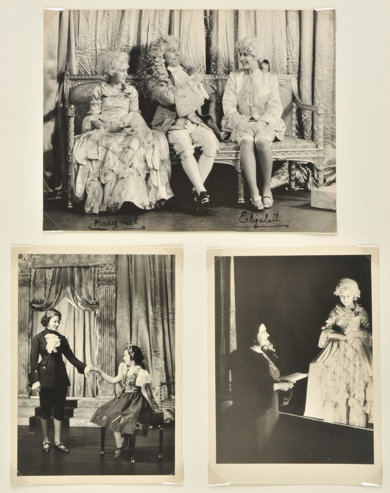 Princess Margaret (L) and Princess Elizabeth (R) on stage in a pantomime of "Cinderella" at Windsor Castle in 1941. 