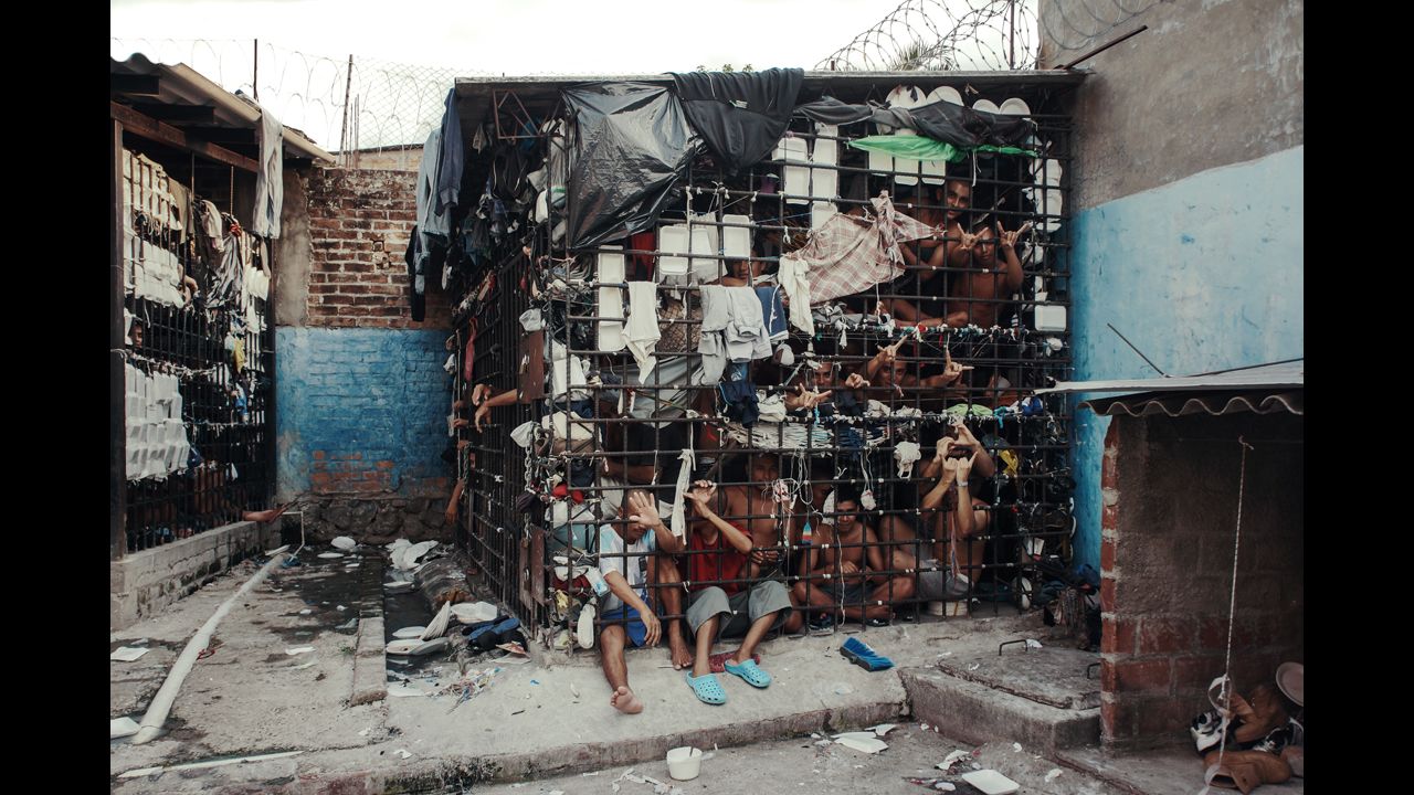 <strong>May 20:</strong> MS-13 gang members languish in one of the three overcrowded "gang cages" in the Quezaltepeque police station in San Salvador, El Salvador. Initially, the cages were designed to be 72-hour holding cells for common criminals and two rival gangs, but many individuals had been imprisoned for more than a year.
