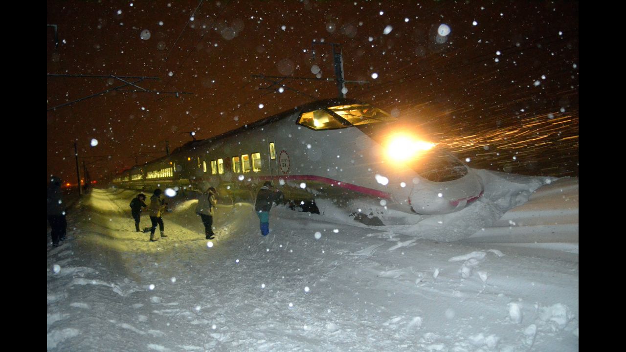 <strong>March 2:</strong> A six-car bullet train in northern Japan sits in the snow after derailing in blizzard conditions. Nobody aboard the train was injured.