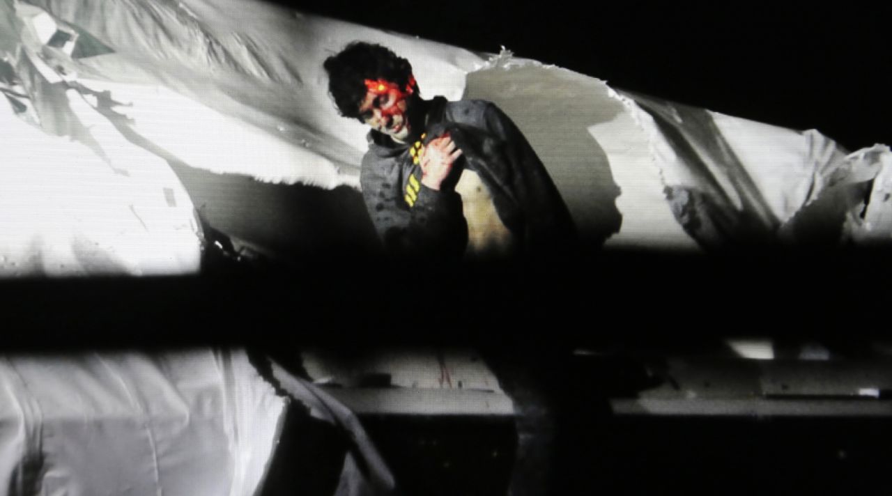 <strong>April 19: </strong>Boston Marathon bombing suspect Dzhokhar Tsarnaev is seen in a boat at the time of his capture in Watertown, Massachusetts.