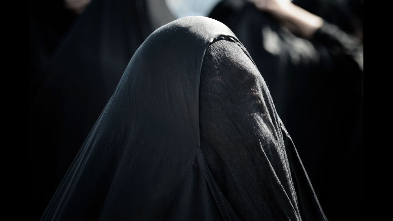 <strong>October 20:</strong> A woman mourns during the funeral of Bahraini political prisoner Hussain Mahdi Habib in the village of Sitra, Bahrain. Habib, 20, escaped from prison on May 19 and was found dead on October 19 after he was allegedly shot near the coastal village of al-Malkiyah.