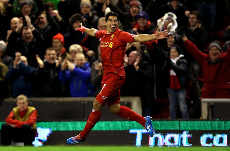 Suarez -- here celebrating one of his four goals against Norwich in December -- had sought a transfer, but was refused permission to talk to Arsenal despite the London club thinking it had triggered a clause in his contract.
