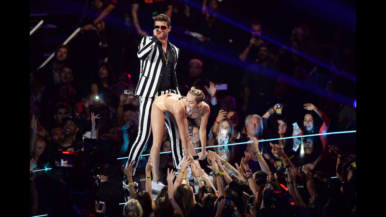 <strong>August 25:</strong> Robin Thicke and Miley Cyrus perform on stage during the MTV Video Music Awards in New York. The provocative performance dominated the headlines and had many people discussing whether it was too risque.