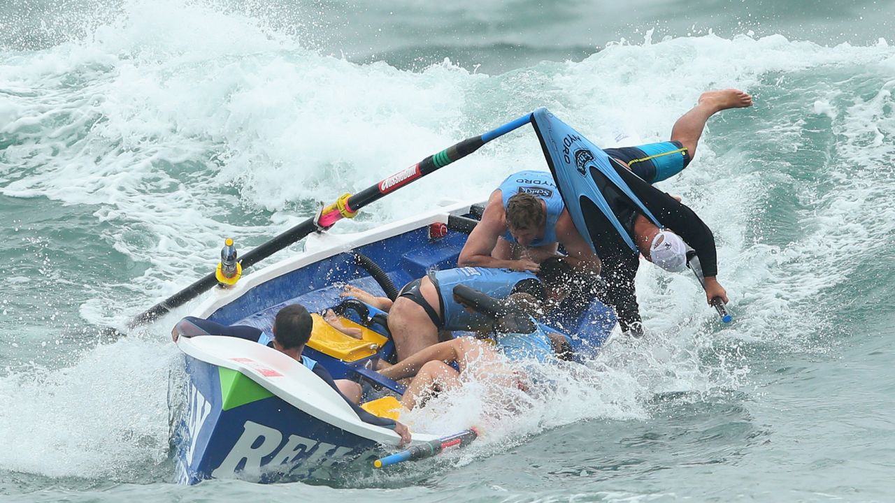 The Bungan surf life-saving crew loses control of their boat during the Ocean Thunder Pro Surf Boat Series on February 2 at Dee Why Beach in Sydney, Australia.