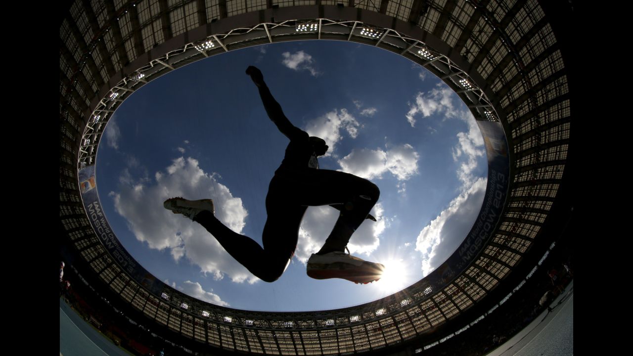 France's Gaetan Saku Bafuanga Baya makes an attempt in the men's triple jump final at the World Athletics Championships on August 18 at Luzhniki stadium in Moscow, as seen through a wide angle lens.
