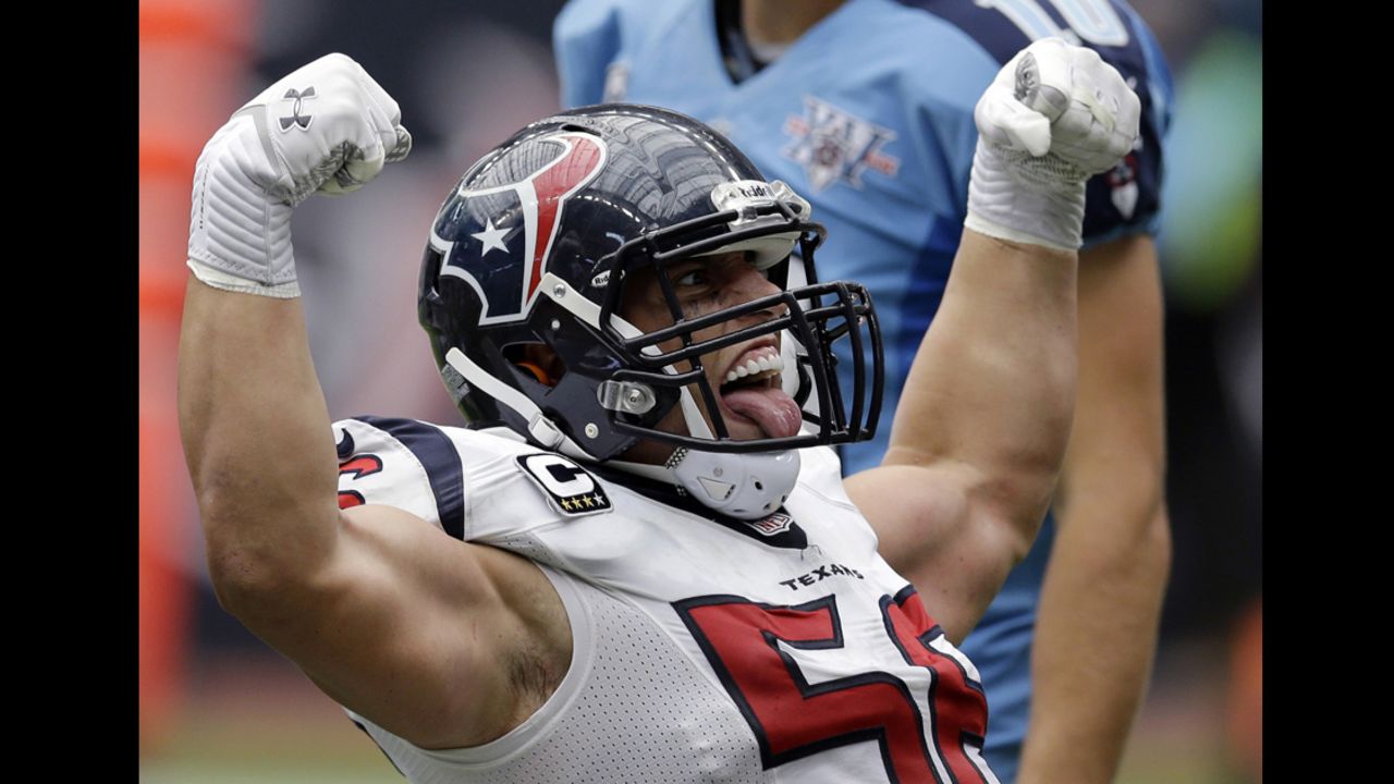 Brian Cushing of the Houston Texans celebrates after helping bring down Chris Johnson of the Tennessee Titans in the end zone for a safety in the fourth quarter of the game on September 15 in Houston. The Texans won 30-24 in overtime.